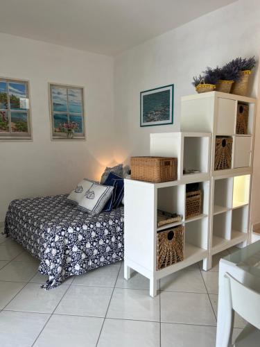 Postel nebo postele na pokoji v ubytování Mare Fuori