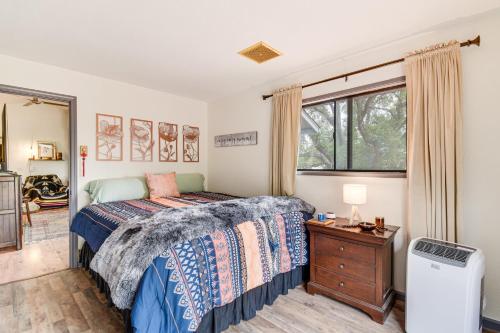 a bedroom with a bed and a dresser and a window at Yosemite Wellbeing Retreat on 5 Acres with Mtn Views in Ahwahnee