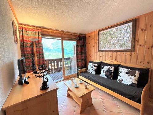 Appartement cosy 5 pers à 20m des pistes et commerces, balcons, parking couvert