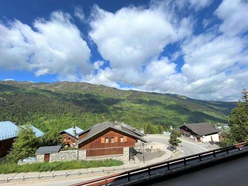 Appartement cosy 5 pers à 20m des pistes et commerces, balcons, parking couvert