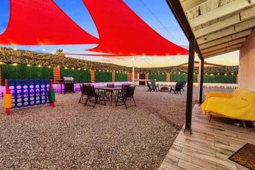 a patio with a ping pong table and chairs at Phoenix Retreat - Studio with King Bed - 10 min from Airp - Unit C in Phoenix