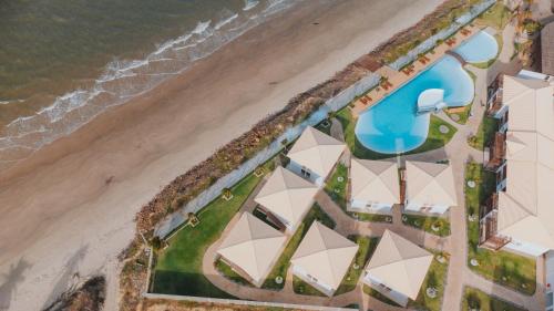 an aerial view of a resort on the beach at Oiti Beach Resort Tutoia in Tutóia