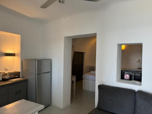 Kuchyň nebo kuchyňský kout v ubytování Theodora Suites