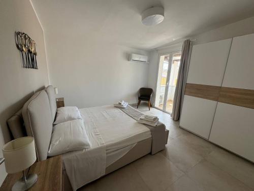 Postel nebo postele na pokoji v ubytování Panima Rooms
