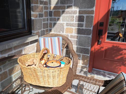 a basket sitting on a chair next to a door at Luxury farm Stay, Alexandria in Glen Robertson