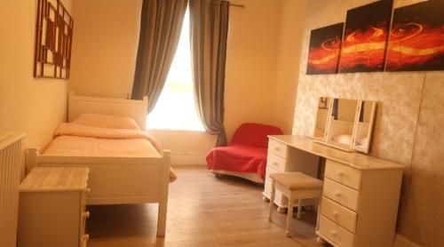 Ένα ή περισσότερα κρεβάτια σε δωμάτιο στο Homestay cambridge central