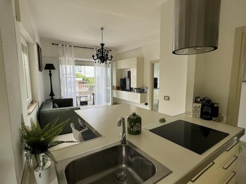 a kitchen with a sink and a counter top at Charm in centre, sunset, movida! in Milano Marittima