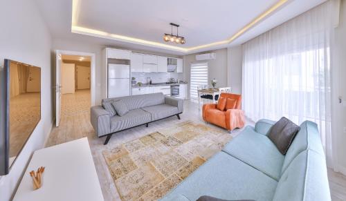 Η κουζίνα ή μικρή κουζίνα στο Begonya Suites