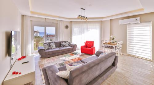 Χώρος καθιστικού στο Begonya Suites