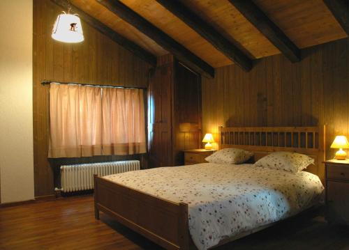 A bed or beds in a room at B&B della Miniera