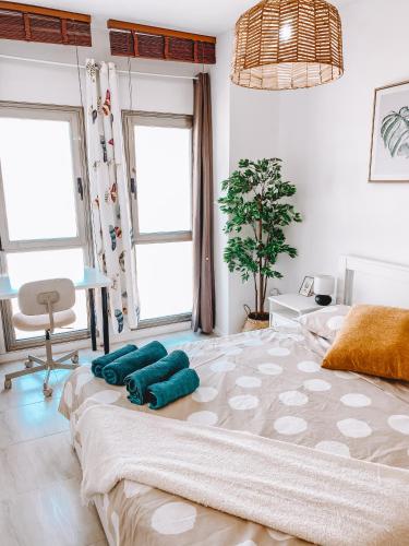 Postel nebo postele na pokoji v ubytování Summer Breeze Apartment