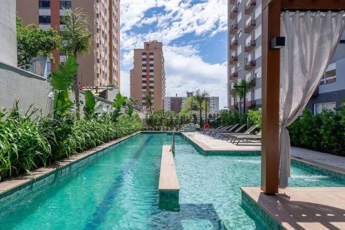 Táxi grátis disponível Terraço, Aconchegante, Gym, Ar, WiFi, PUCRS, Pet Menor preço em Táxi grátis disponível Terraço, Aconchegante, Gym, Ar, WiFi, PUCRS, Pet