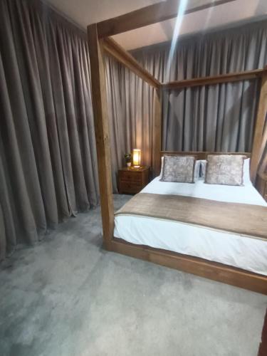 Katil atau katil-katil dalam bilik di Luxury in Pietermaritzburg