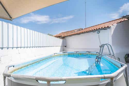 a large swimming pool in a building at Campinhus in Campinho