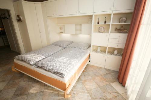 Postel nebo postele na pokoji v ubytování Ferienwohnung Seesternresidenz App.12