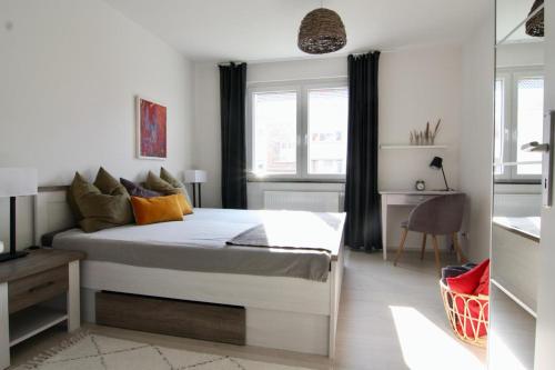 Postel nebo postele na pokoji v ubytování Ferienwohnung Strandluft - Niendorf Ostsee