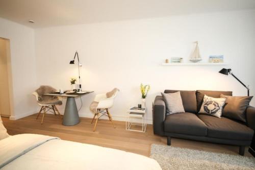 Posezení v ubytování Ferienwohnung Am Strand