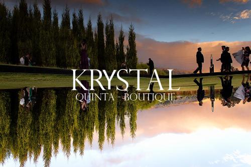 a group of people standing around a body of water at HOTEL BOUTIQUE KRYSTAL in Quito