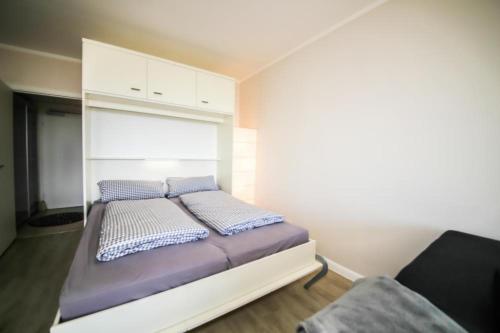 Postel nebo postele na pokoji v ubytování Ferienwohnung Residenz App. 327