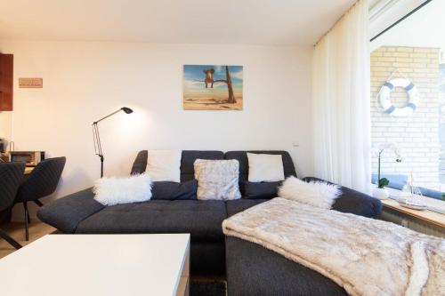 Postel nebo postele na pokoji v ubytování Ferienwohnung Strandbude 11 -Timmendorfer Strand