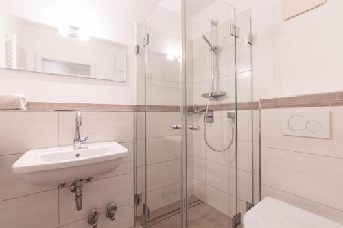 Ένα μπάνιο στο Ferienwohnung Sailor's Cabin