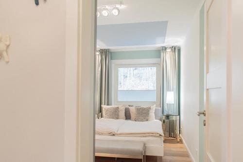 Postel nebo postele na pokoji v ubytování Ferienwohnung Nordwind