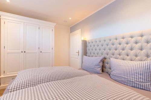Postel nebo postele na pokoji v ubytování Ferienwohnung Aalkate App 1
