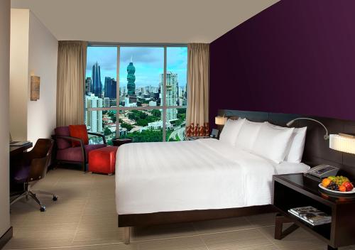 Postel nebo postele na pokoji v ubytování Megapolis Hotel Panama