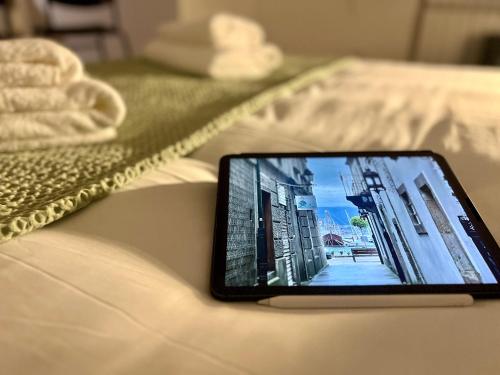 a cell phone sitting on a hospital bed at Balnea Baiona in Baiona