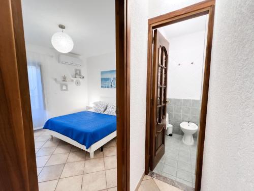 En eller flere senge i et værelse på CefalHome - VETERANI