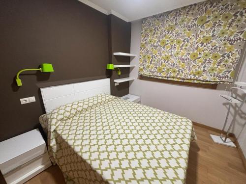 Ένα ή περισσότερα κρεβάτια σε δωμάτιο στο Galiciaguesthome Baltar Vistas