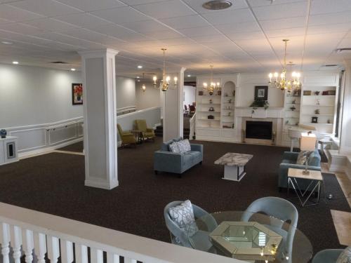 a living room with furniture and a fireplace at The View Studio, Suites and Event Venue in Orlando