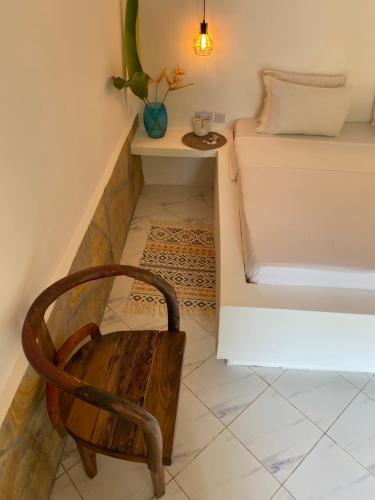 Ένα ή περισσότερα κρεβάτια σε δωμάτιο στο Cactus lodge Zanzibar