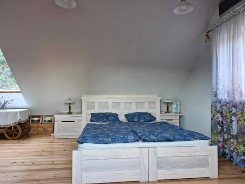 Llit o llits en una habitació de Jūrena