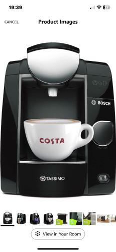 a coffee machine with a bowl on top of it at Marina views, Kinsale, Hosted by Exquisite holiday homes, sleeps 20 in Kinsale