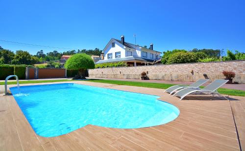 GALIHOST - Chalet con piscina en Vilagarcía de Arousa