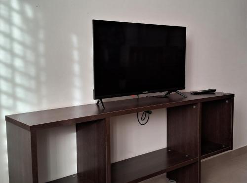 Μια τηλεόραση ή/και κέντρο ψυχαγωγίας στο Dorrego Apartment