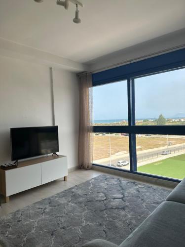 TV a/nebo společenská místnost v ubytování Apartamento duplex Mediterránean view