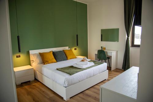 Postel nebo postele na pokoji v ubytování Catania Centro, Italia ,Sicilia, Orgahome Appartamento