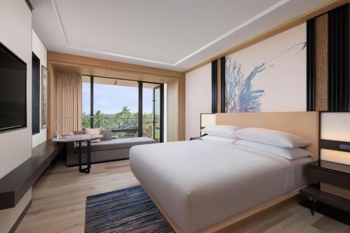 Postel nebo postele na pokoji v ubytování Courtyard by Marriott Goa Colva