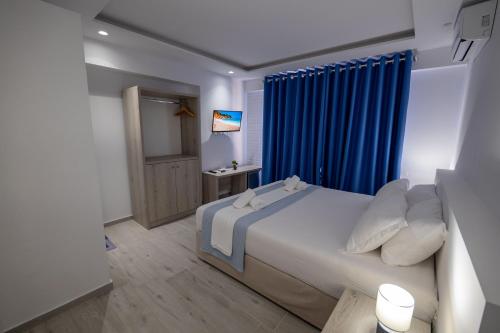Postel nebo postele na pokoji v ubytování Sea View Hotel