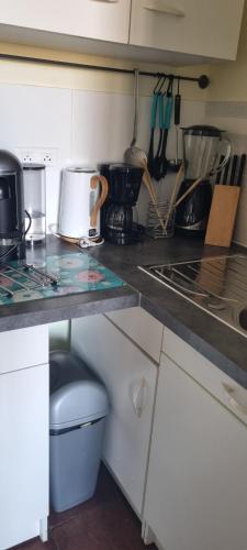 Kuchyň nebo kuchyňský kout v ubytování Le Gîte d'Olympe