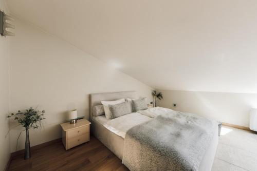 Una cama o camas en una habitación de Hotel Libava