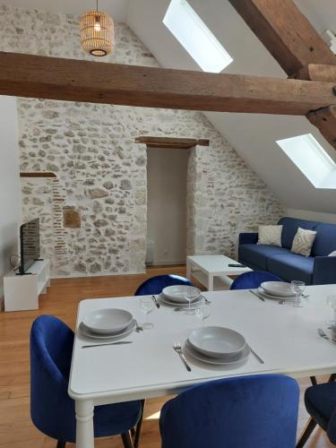 Ruang duduk di Appartements L'hirondelle