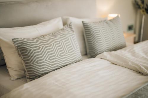 Una cama o camas en una habitación de Hotel Libava
