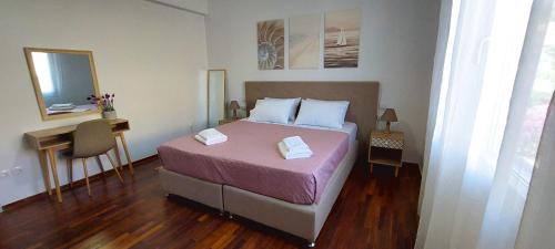 Кровать или кровати в номере Penelope's House