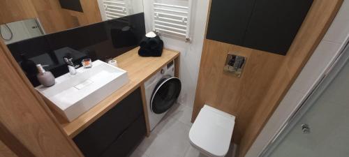 Koupelna v ubytování Słoneczny Apartament Poleska