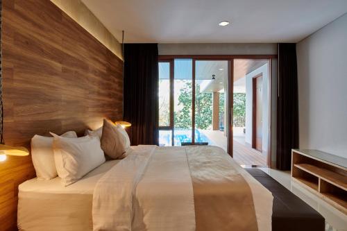 Ένα ή περισσότερα κρεβάτια σε δωμάτιο στο Asmaya Hill View Villa 7 bedrooms with a private swimming pool