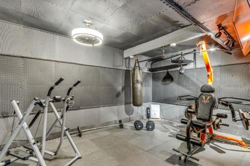 a gym with exercise equipment in a room at Waterfront Florida Vacation Rental with Boat Dock in Milton