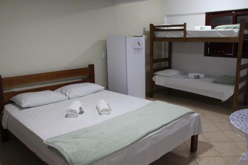 Postel nebo postele na pokoji v ubytování Hotel Bem Te Vi